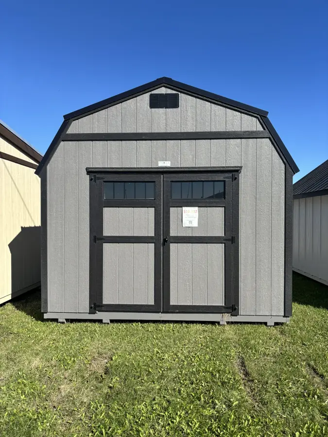 Grey lofted barn with black double doors